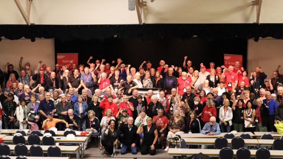 A large group shot of retired workers