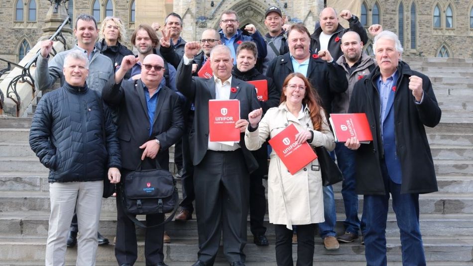 Renaud Gagné and Unifor lobbyists on the steps of Parliment Hill in Ottawa.