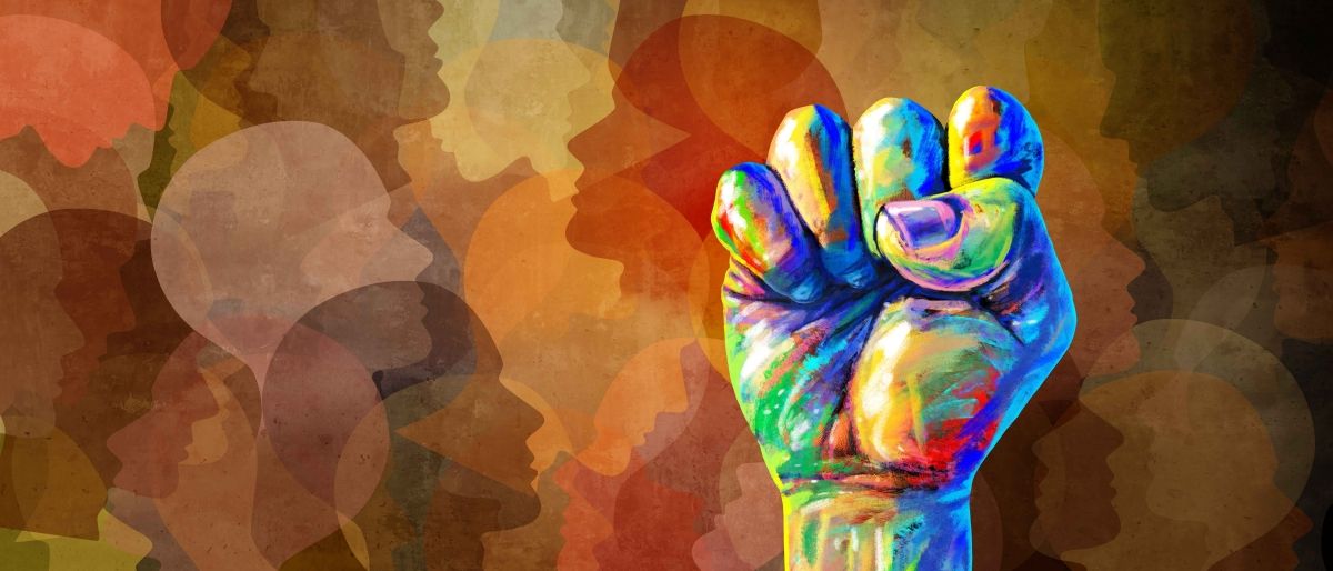 Colourful fist in the air, surrounded by silhouettes in watercolour style.